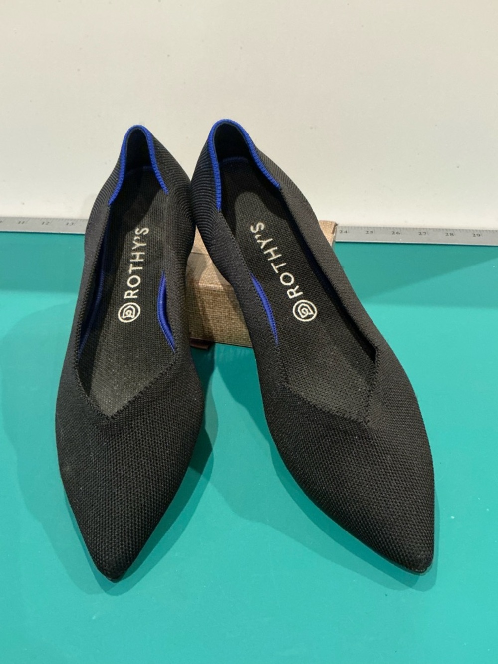 Rothy's Black Pointed Knit Flats with Blue Trim Accent